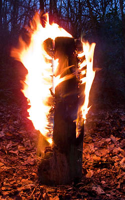 Fire Log lit and starting to catch. - Ice Raven - Sub Zero Adventure - Copyright Gary Waidson, All rights reserved.